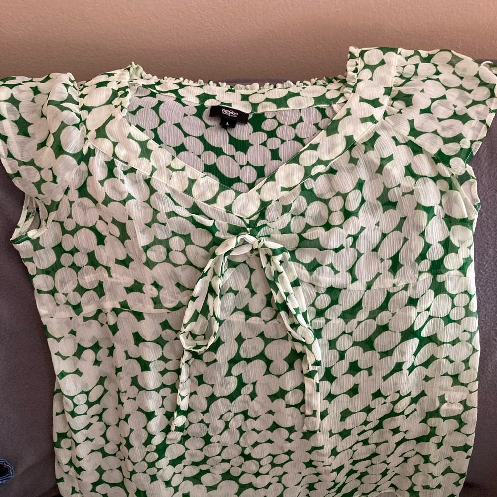 Green and cream blouse